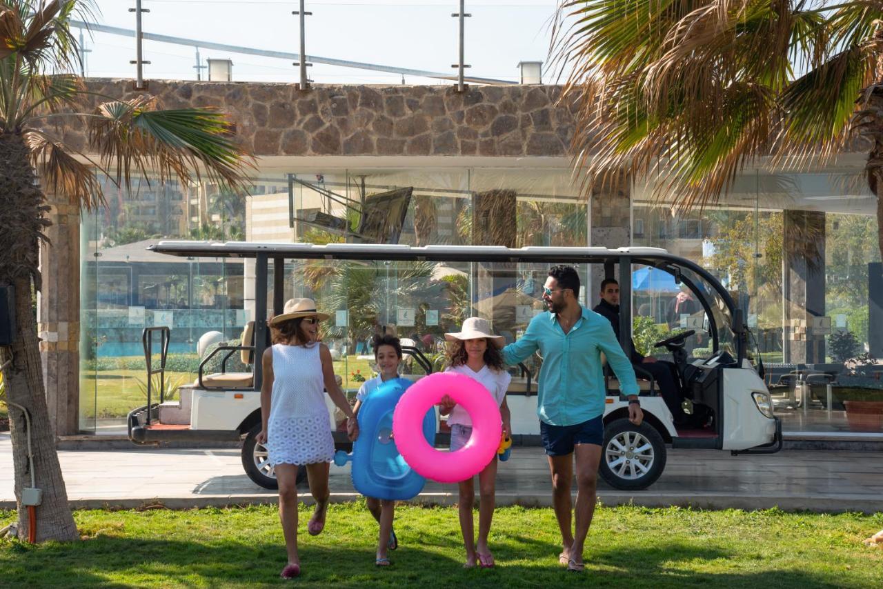 Hotel Grand Ocean El Sokhna à Ain Sukhna Extérieur photo Family at the beach