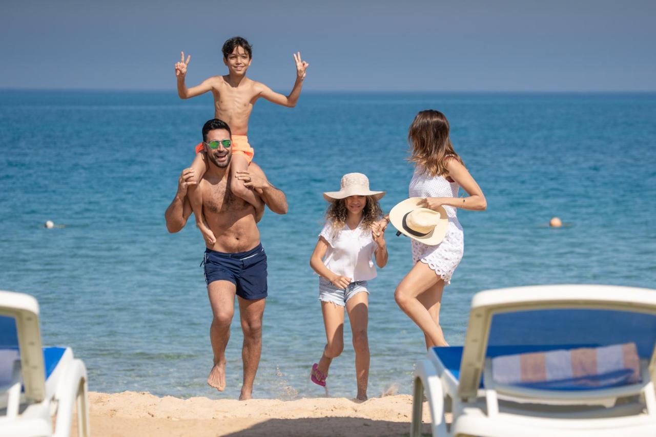 Hotel Grand Ocean El Sokhna à Ain Sukhna Extérieur photo Family on a beach
