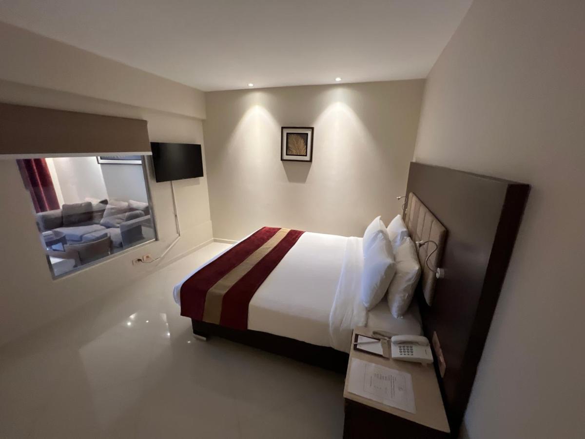 Hotel Grand Ocean El Sokhna à Ain Sukhna Extérieur photo A bedroom at the hotel