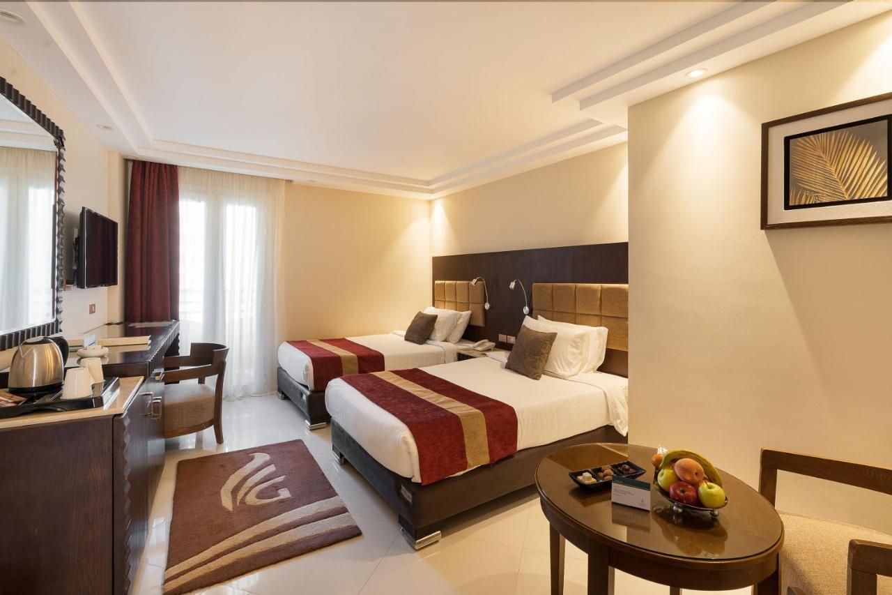 Hotel Grand Ocean El Sokhna à Ain Sukhna Extérieur photo A room at the hotel