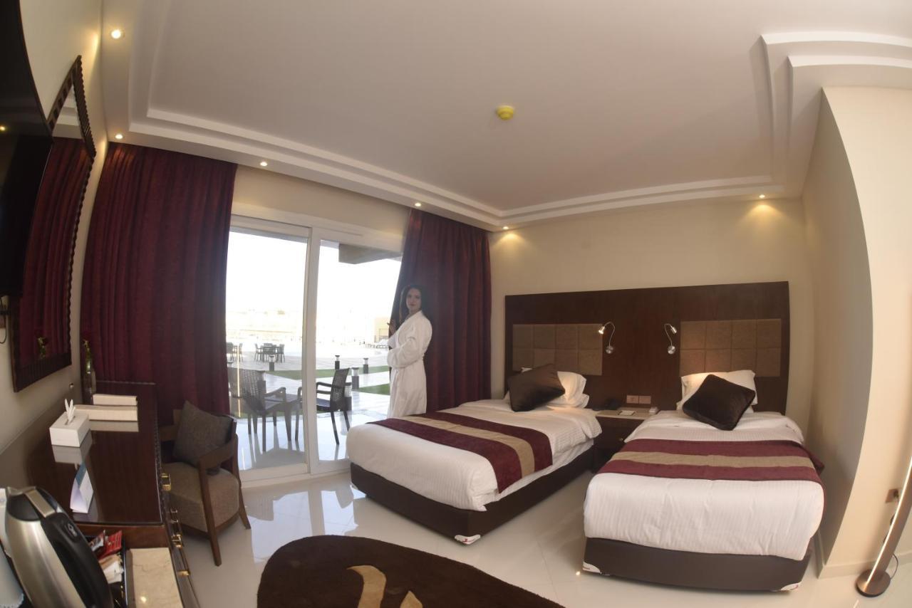 Hotel Grand Ocean El Sokhna à Ain Sukhna Extérieur photo A room at the hotel